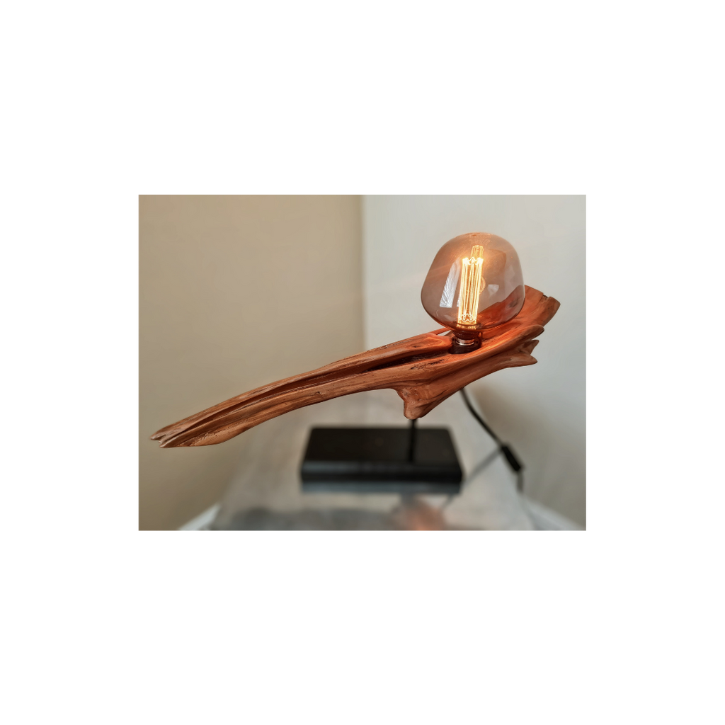 Wooden lamp with a glass shade on a white background