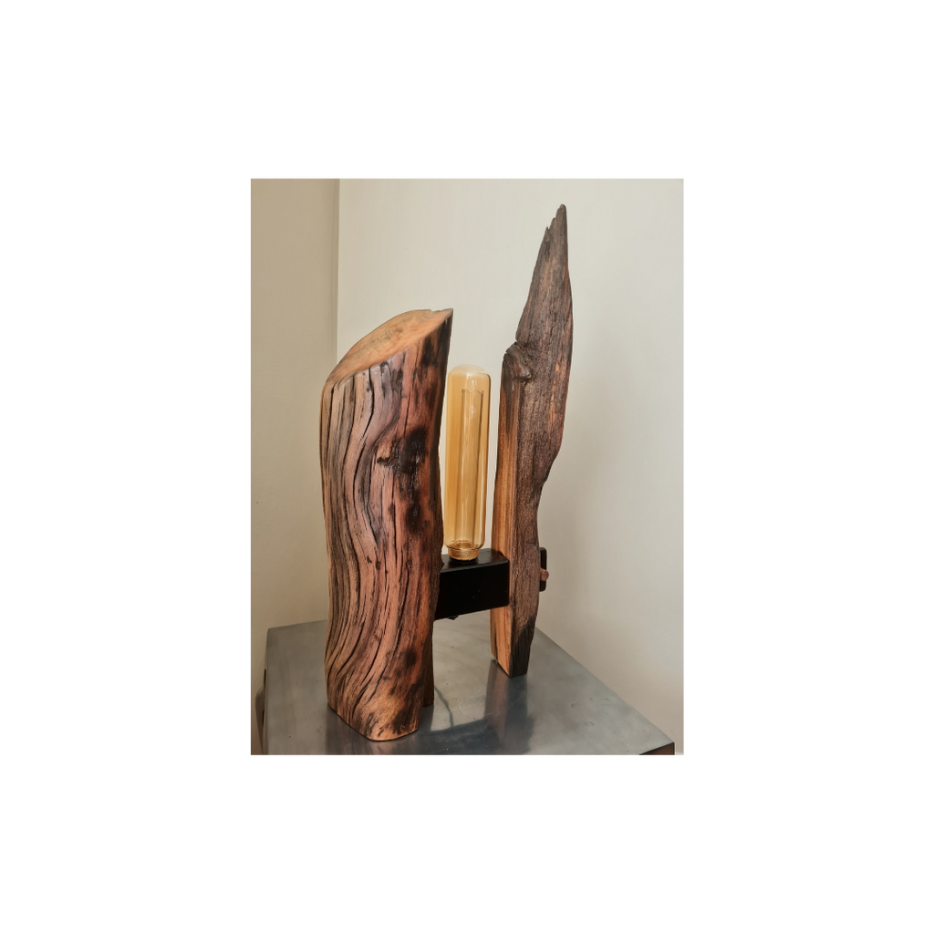 Wooden lamp with a unique design on a reflective surface