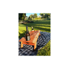 Wooden wine table with bottles and glasses on a checkered blanket in a park