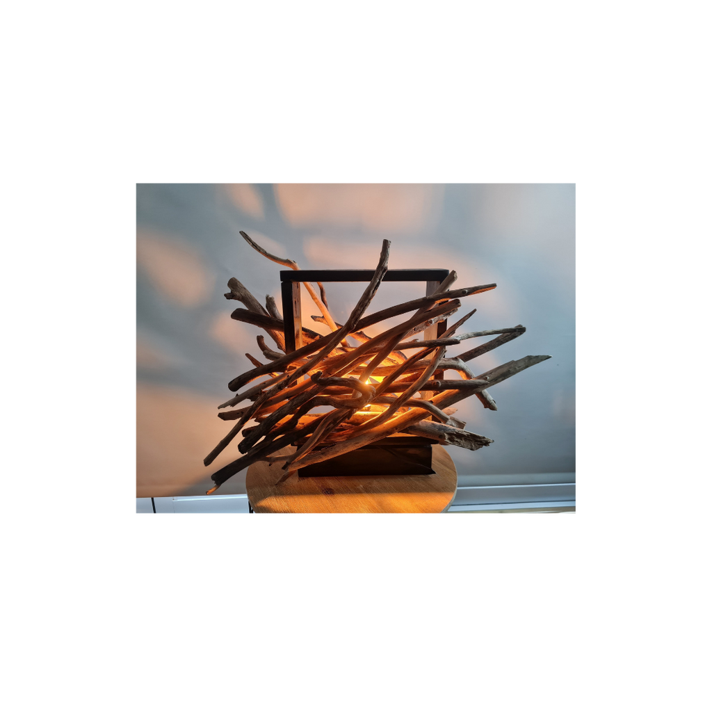 Lamp made of intertwined branches with a white background