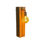 Wooden table lamp with a lit bulb on a white background