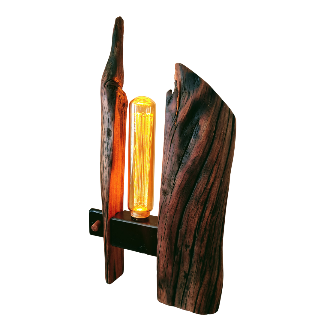 Wooden lamp with a unique design and a glowing bulb on a white background